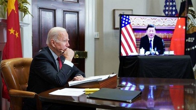 Presiden Amerika Serikat, Joe Biden saat teleconfrence dengan Presiden China, Xi Jinping