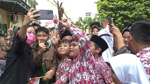 Puan Maharani bersama siswa SMK Muhammadiyah, (SinPo.id/muhammadiyah.or.id)